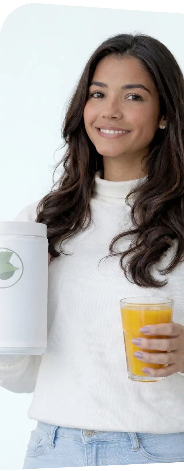 A smiling female entrepreneur holding a branded supplement container and a glass of juice, illustrating the process of building and testing customer-centered products based on intelligent opinions.